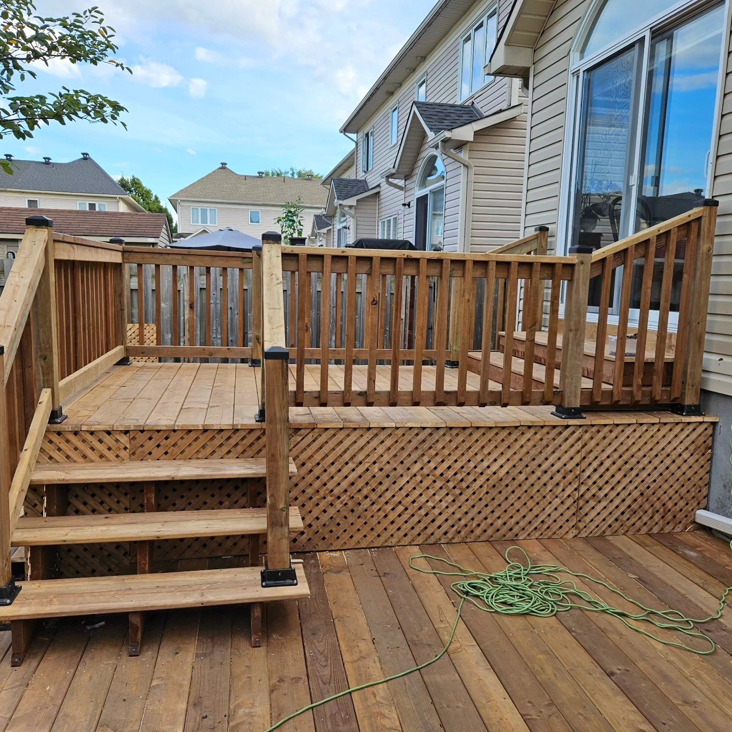 Custom deck with stairs and lattice skirting